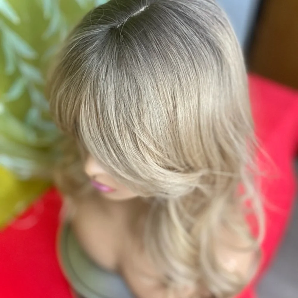 Golden dirty blonde layered wig with bangs and roots